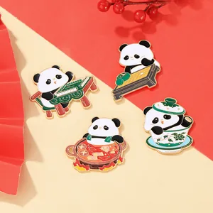 Macro detail of enamel panda pins featuring mahjong and hotpot in traditional style