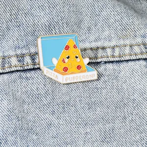 Close-up of a smiling pizza enamel pin on a denim jacket for casual fashion style