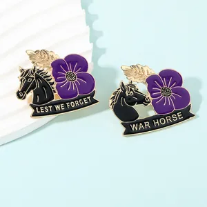 Detailed pair of purple poppy and war horse badges with Lest We Forget engraving