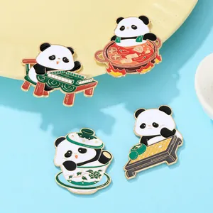 Close-up of creative panda enamel pins playing mahjong and eating hot pot snacks