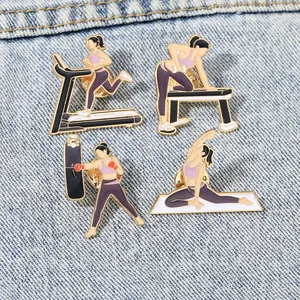 Set of 4 fitness enamel pins featuring running, yoga, and boxing on denim fabric