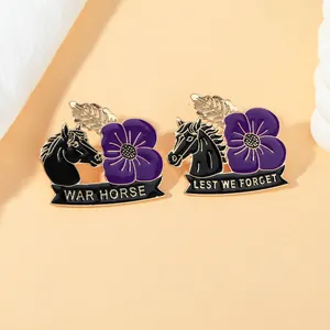 Detailed view of War Horse enamel badges with purple poppy and Lest We Forget engraving