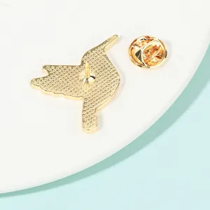Colorful bird brooch pin in golden finish with enamel detail and secure butterfly clasp