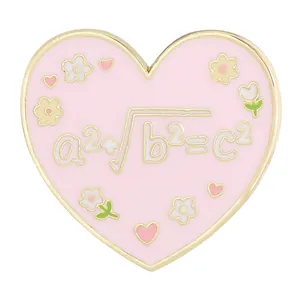 Pink heart enamel pin with mathematical formula and floral design on gold alloy base