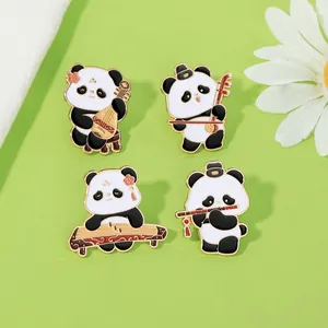 Close-up of enamel panda pins playing traditional instruments like pipa and erhu