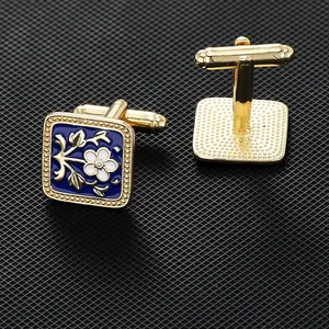 Elegant gold square cufflinks with blue enamel flower and vine patterns for men