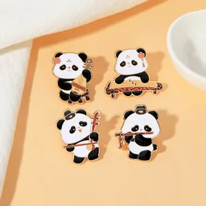 Detailed macro view of four panda enamel pins with traditional Chinese instruments