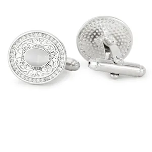 Boutons de manchette pour hommes avec pierre œil de chat et bordure en diamants