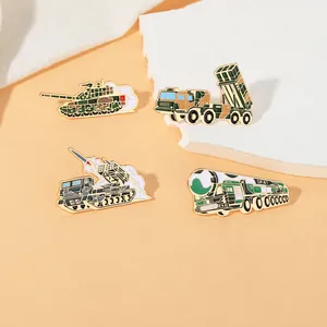 Detailed macro of four camouflage military badges including a DF-41 missile enamel pin
