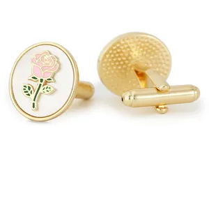 Elegant gold rose cufflinks with pink flower on white background for French shirts