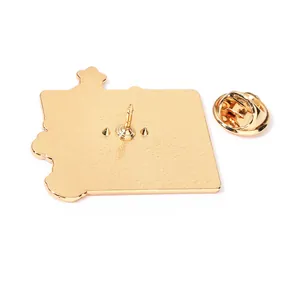Back view of cute Japanese enamel pin with golden metal finish and butterfly clutch closure