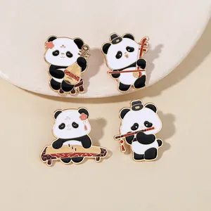 Detailed macro view of four panda enamel pins playing traditional Chinese instruments