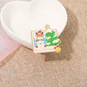 Detailed macro of a Christmas reindeer enamel pin resting on a heart-shaped plate