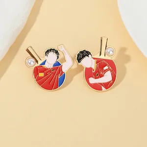 Detail of red table tennis pins with anime player designs and white pearl accents