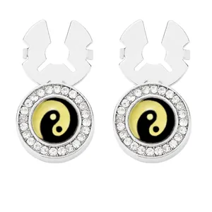 Boutons de manchette argentés avec motif Yin Yang jaune et noir et bord en cristal