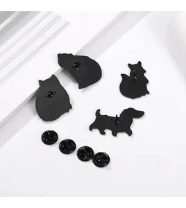 Detail view of four animal enamel pins back with black butterfly clutch fasteners