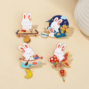 Detailed view of four enamel rabbit brooches with mid-autumn festival festive charms