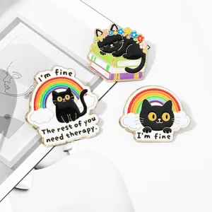 Three-piece black cat enamel pin set featuring rainbow designs and funny quotes