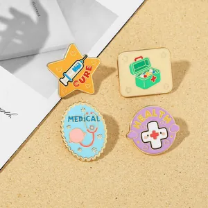 Set of four colorful enamel medical brooches with stethoscope and syringe icons