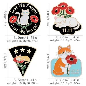 Pins de chat en émail avec coquelicots, texte Lest We Forget et date du 11.11