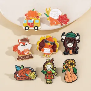 Detail shot of 8-piece Thanksgiving enamel pins featuring turkeys and pumpkins