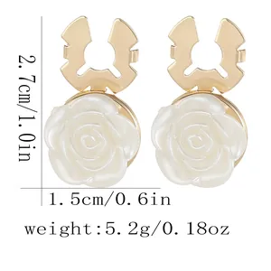 Detail view of rose earrings with dimensions 2.7cm height and 1.5cm width specs