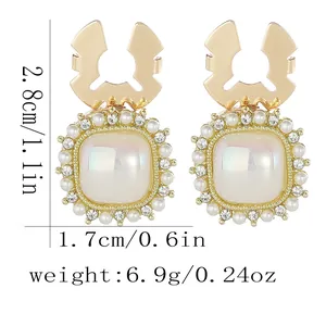 Elegant vintage collar clips with shell-like stones, pearls and sparkling crystals