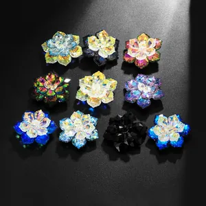 Macro detail of multifaceted crystal flower buttons showing diverse color gradients and cuts