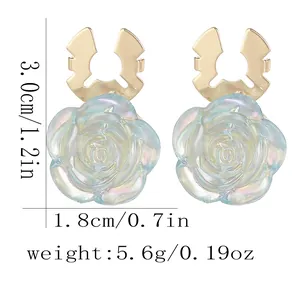 Elegant gold rose stud earrings with iridescent translucent resin petals and dimensions