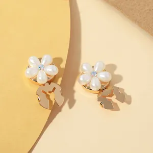 Elegant floral pearl collar buttons with aurora rhinestone accents in gold metal finish