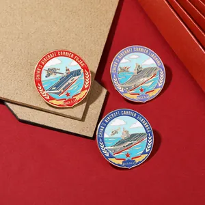 Detailed macro shot of three Chinese aircraft carrier enamel pins on a luxury background