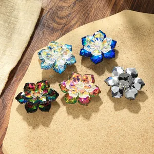 Detail of floral crystal cufflinks showing assorted colors and the silver metal back clip