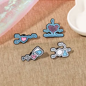 Set of four science-themed enamel pins featuring chemical formulas and heart graphs