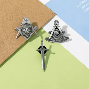 Three-piece Freemasonry badge set with lion head, compasses, and sword in silver finish