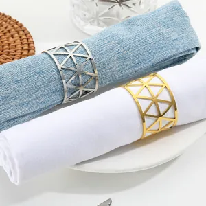 Modern geometric triangle metal napkin rings in gold and silver finish for dining decor