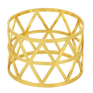Modern gold triangular napkin ring with minimalist geometric hollow design for table decor
