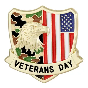 Shield badge featuring an eagle, US flag, and camouflage with Veterans Day text