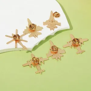 Golden fighter jet alloy pins showing back view with butterfly clutch fasteners