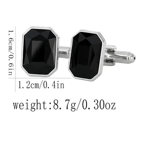 Octagonal black stone cufflinks with silver metal base and detailed dimension markings