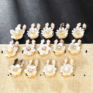 Elegant 14-piece camellia flower cufflinks with pearls and rhinestones on gold base