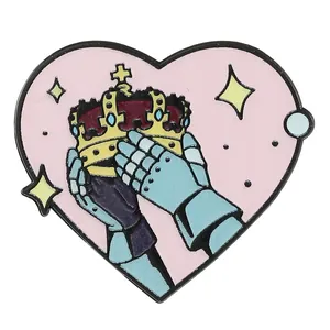 Detailed enamel brooch featuring medieval armored hands holding a golden crown on pink heart