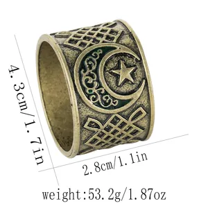 Detailed view of vintage star and moon napkin ring with green enamel and size markings