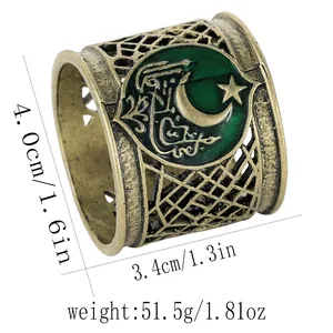 Detailed macro view of bronze openwork napkin ring with green star and moon enamel emblem