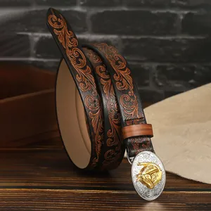 Detailed relief of golden horse head on silver buckle with vintage brown leather strap