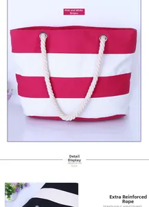 Detail view of pink striped canvas tote bag featuring reinforced thick rope handles