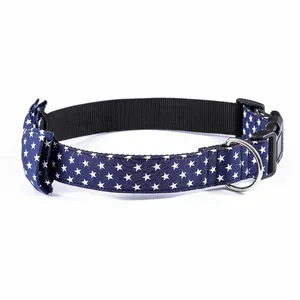 Blue cotton dog collar with white star pattern and decorative bow tie for large dogs