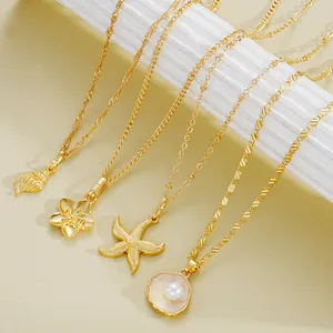 Gold layered necklace set featuring starfish, shell, pearl and flower pendants for women