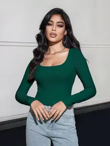 Detail view of the dark green ribbed fabric and square neckline on a slim fit long sleeve tee