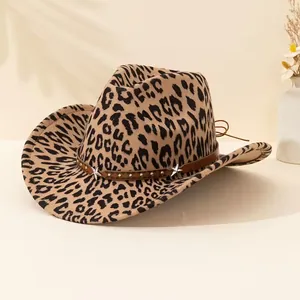 Close-up of leopard print cowboy hat with star studded leather band and adjustable cord