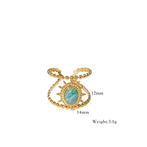 Detail of vintage sunburst ring with turquoise stone, 12x14mm size and 3.1g weight